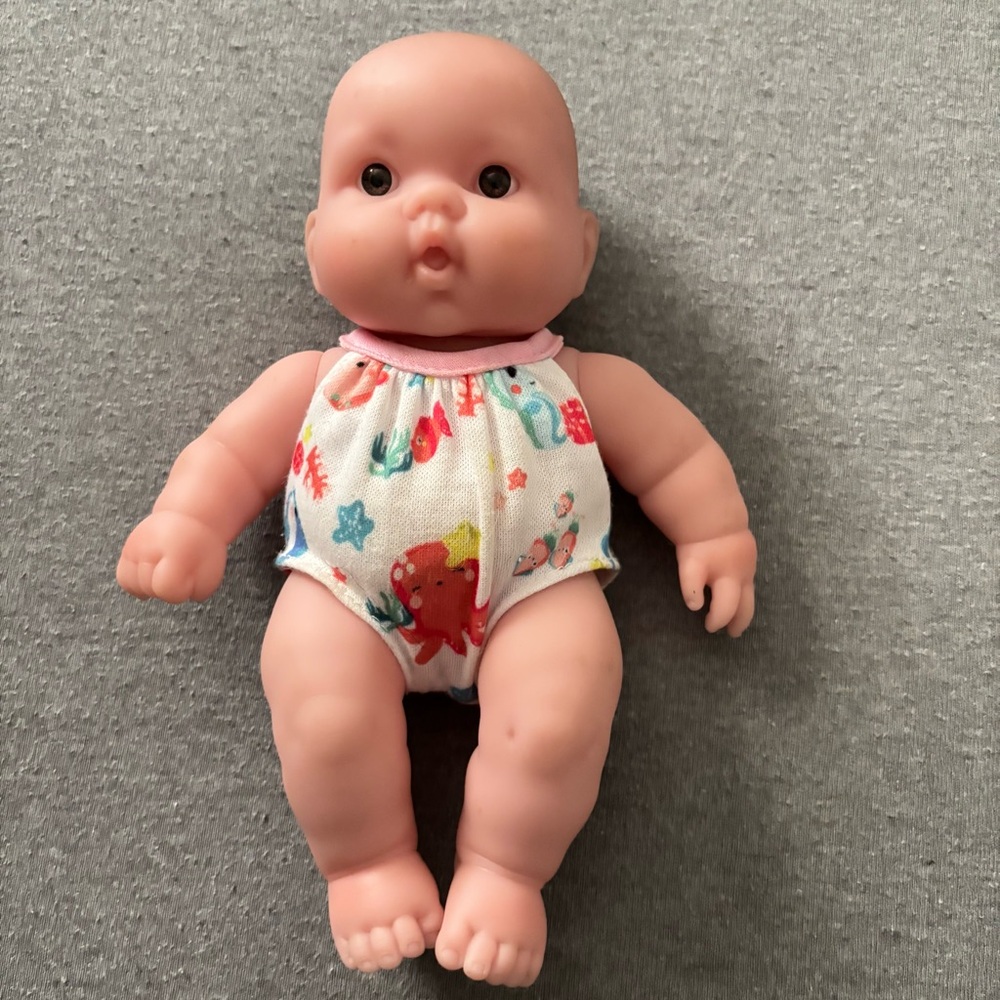 Adorable Baby Doll with Colorful Outfit